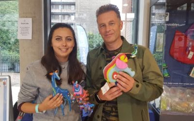 Chris Packham and woman posing for a picture