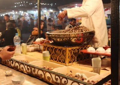 A man cooking food on a table