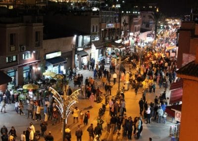 A group of people standing in front of a crowd