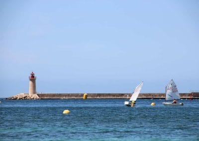 A small boat in a large body of water