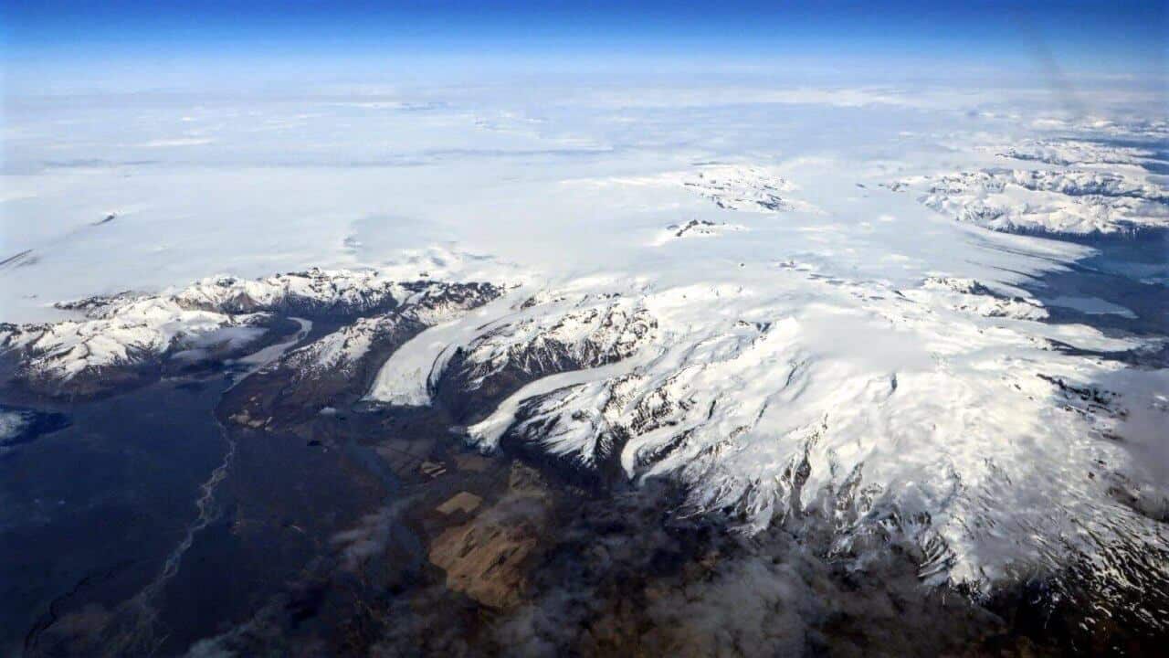 A view of a snow covered mountain