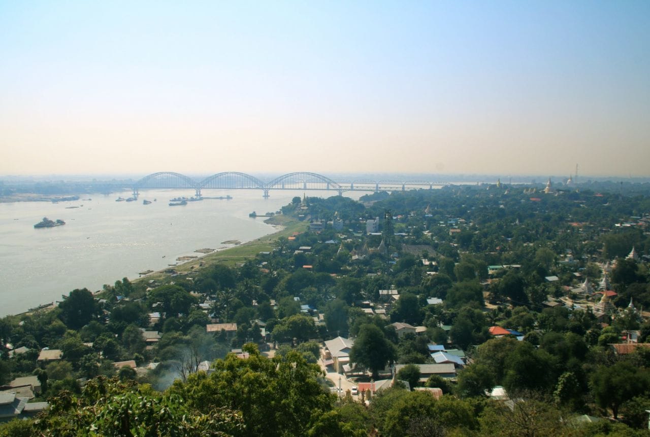 A view of a large body of water with a city in the background