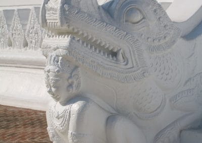 A close up of a statue