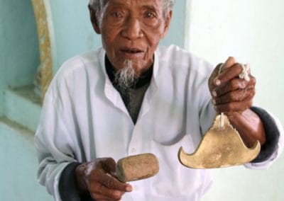 A man holding a glass